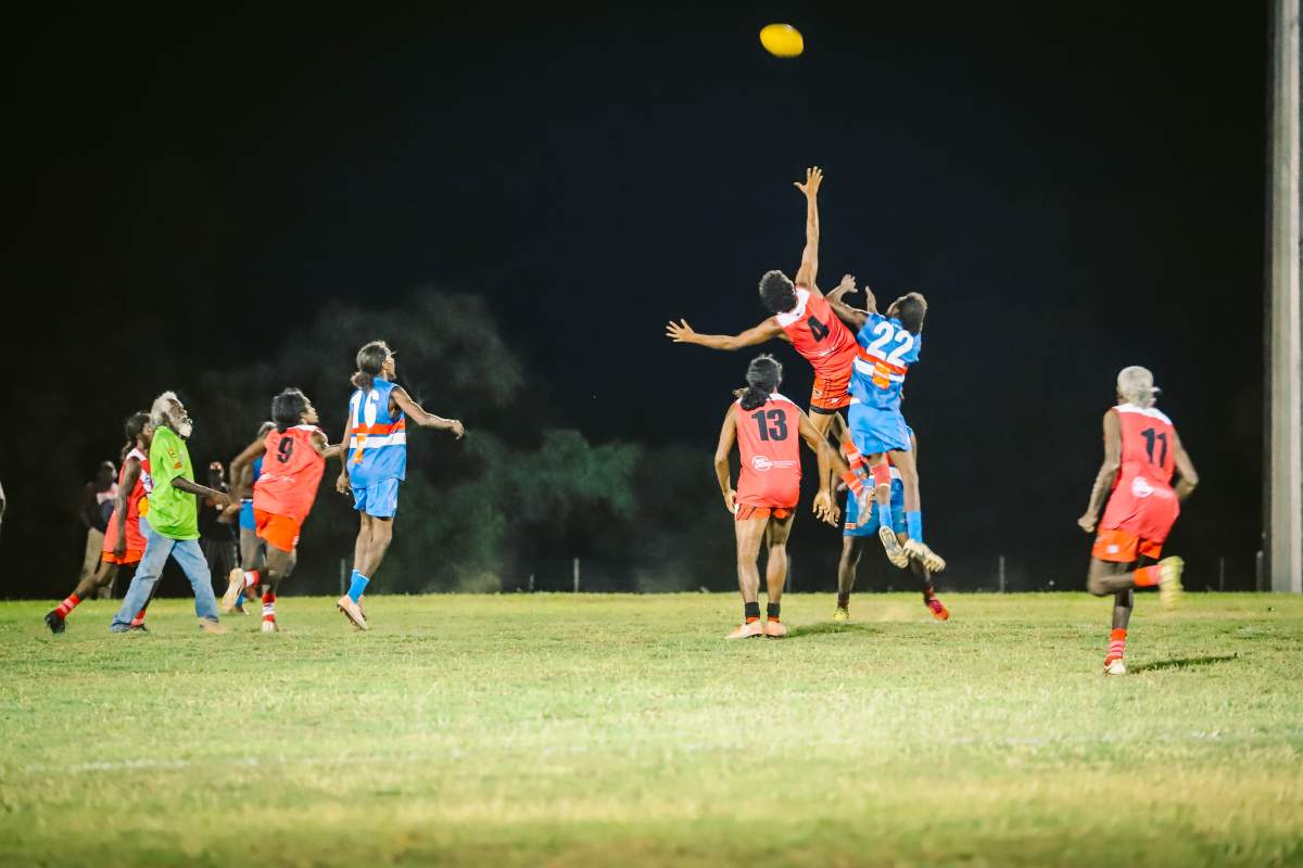 Two AFL teams playing a night match